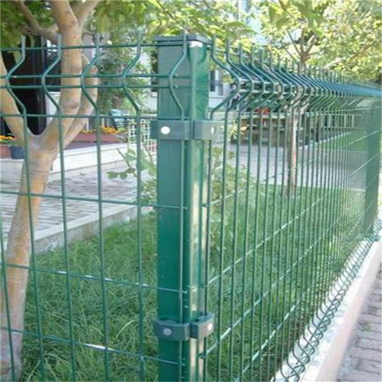 green welded wire mesh fence with post